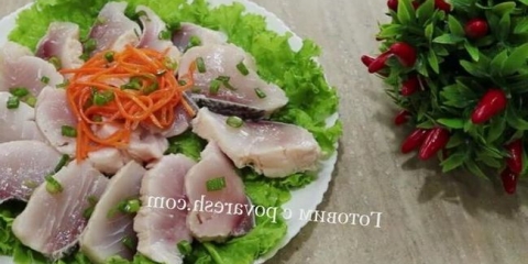 Marinirani tolstolobik u suncokretovoj ulju sa lukom i sirćetom